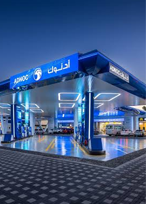 ADNOC service station at night
